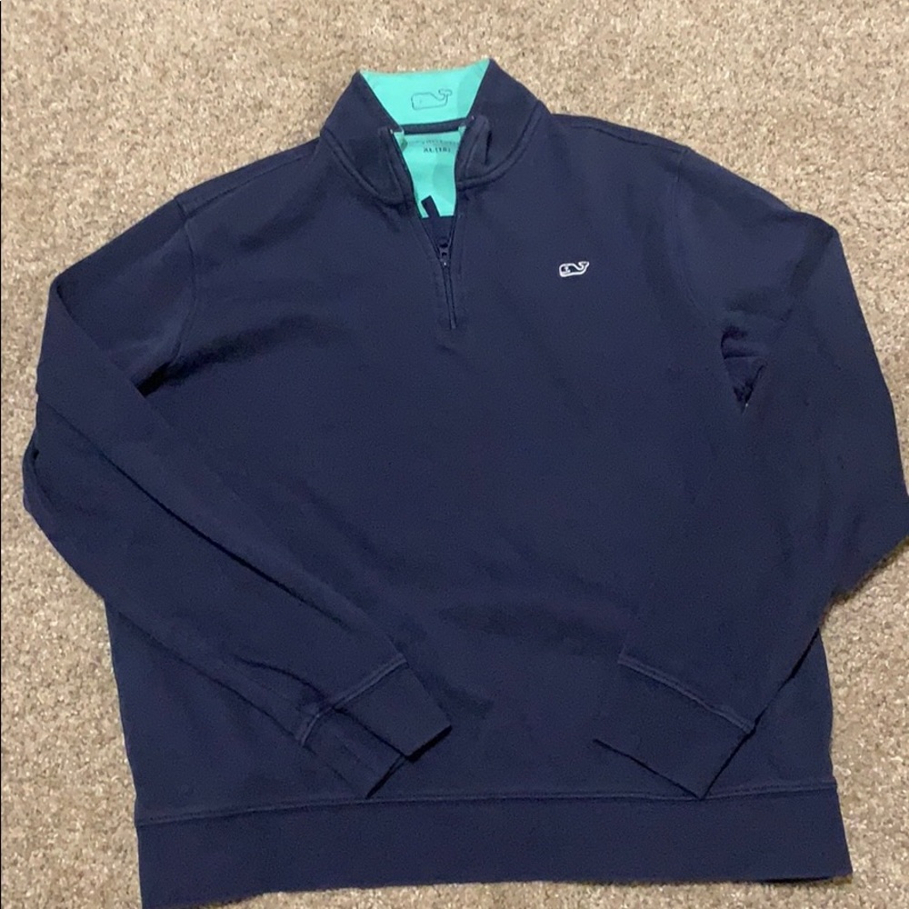 It’s a blue vineyard vines dress shirt,